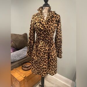 Faux fur animal print trench coat.